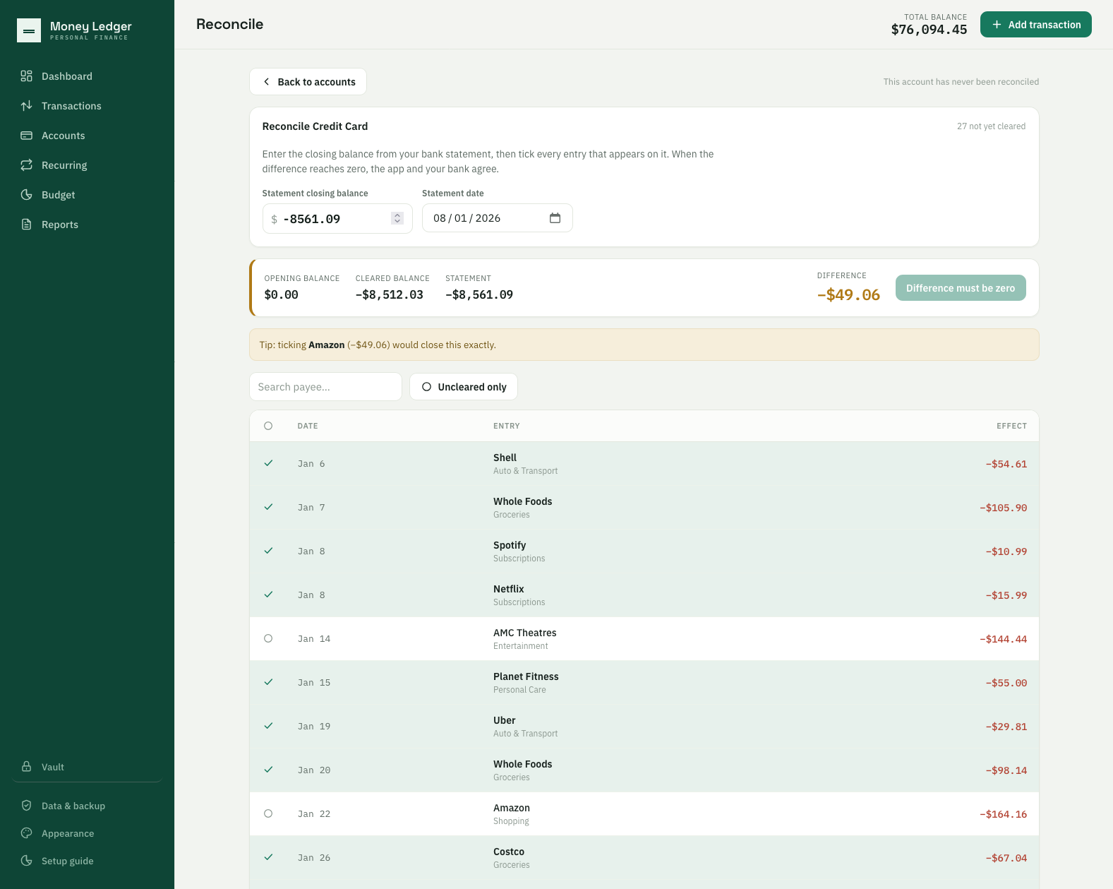 The reconcile screen for a credit card: a typed statement balance of -8,561.09, a cleared total, the remaining difference, and a hint identifying the single unticked transaction whose amount would close the gap.
